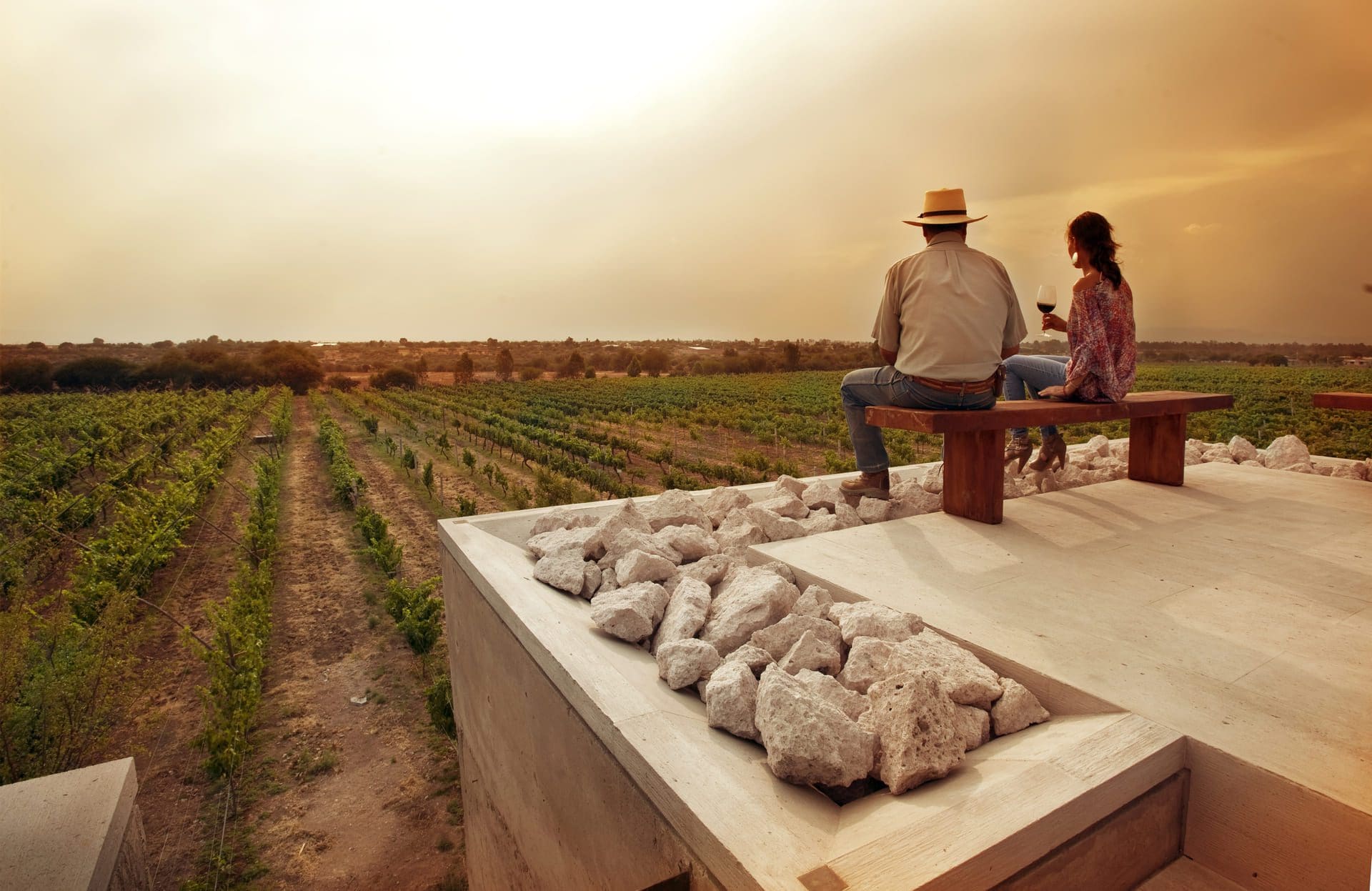 Couple drinking wine at Pepenacho ranch