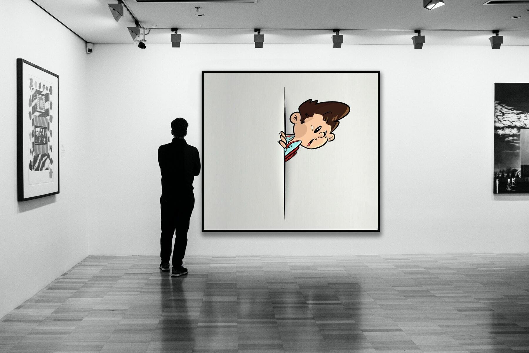Hombre de espaldas mirando un cuadro de arte contemporáneo